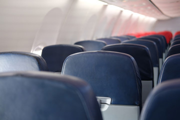 empty passenger seat inside airplane. chair in aircraft