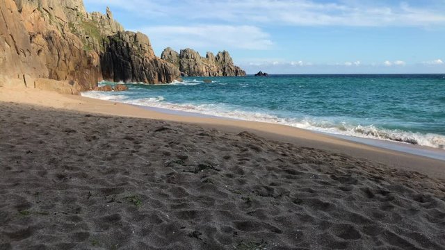Cornish Sandy Beach with Ocean Waves and Turquoise Seas