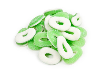 Green gummy candies rings isolated on white. Top view. Jelly  sweets.