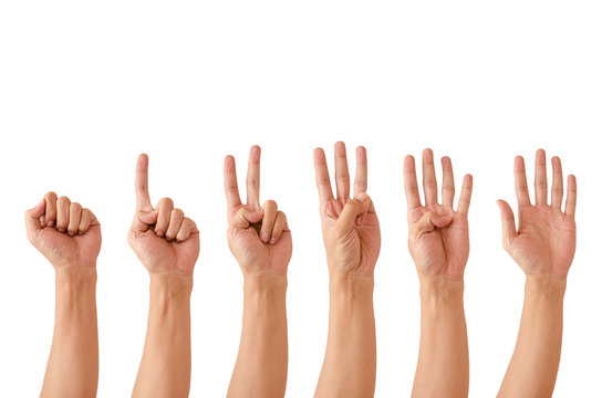 The hand of the man showing the symbol instead of the number
