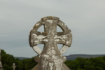 Celtic cross at the graveyard at Kilmacduagh