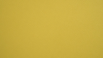 Texture of grunge panorama yellow leather. Yellow background.
