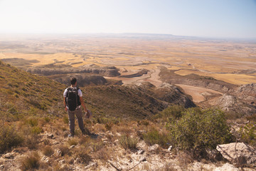 backpacker traveler with hat and white shirt