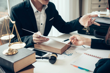 Businessman and lawyer discuss the contract document. Treaty of the law. Sign a contract business.