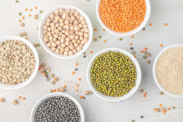 Various legumes in small bowls