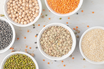 Various legumes in small bowls