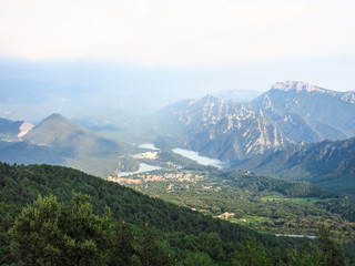 Panoramic view of the pre-Pyrenean area of Catalonia, with the Sierra Cadí, Llosa del Cavall pond and the small town of San Lorenzo de Morunys.