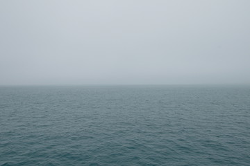 Obraz premium Mist over the Mediterranean sea, Malaga, Spain