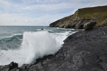 Breaking wave Tregardock Beach Cornwall England