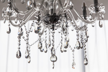 chandelier with pendants, isolated on white selective focus