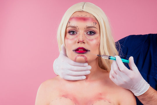 parody of beautiful perfection victim fashion woman with surgery njection and surgeon scalpel.halloween makeup greasepaint