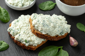 Ricotta cheese spinach sandwich with coffee. healthy breakfast