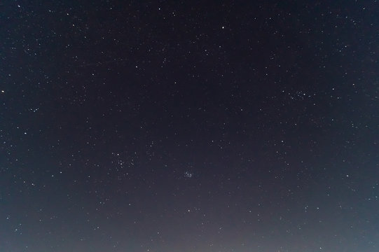  Underexposed night sky low light photo. A lot of stars and constellations on dark sky. Stock photo of deep sky.
