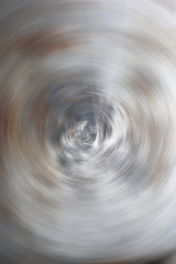 Soft ripple action of sound sonic wave formed in centre, colourful earth tone ranged from lightness to darkness, rounded and mixed in background. Abstract in shape, form and meaning. Beautiful indeed.