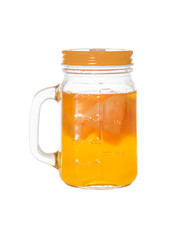 Homemade fermented drink Kombucha in a glass jar. Isolated on white background