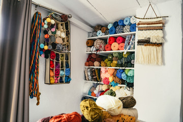 Large selection of multicoloured yarns for weaving