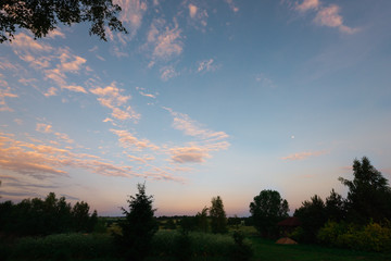 Fototapeta premium Summer evening sky in rural Russia