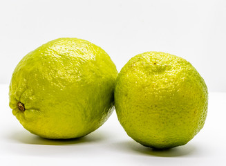 Colourful citrus on various back drops, lemons, limes, oranages. Calgary, Alberta, Canada