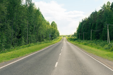 Fototapeta na wymiar Empty countryside road in summertime