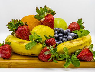 Assorted fruits oina bowl or on a cutting board. Calgary, Alberta, Canada