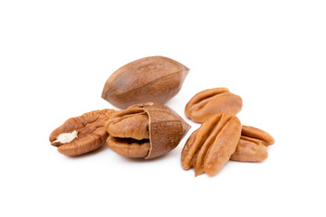 Fresh pecan nuts isolated on a white background