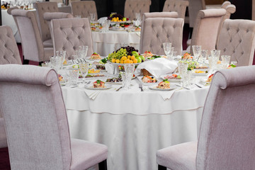 Delicious dishes on the festive table in the restaurant. Serving table.