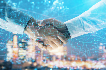 Double exposure of abstract technology drawing on cityscape background with two businessmen handshake. Concept of tech role in business