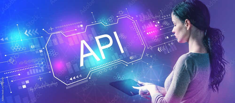 Aufkleber api concept with business woman using a tablet computer