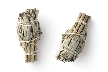 white sage smudge sticks used for spiritual incenses isolated on a white background, two different...