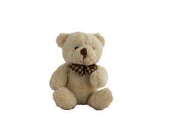 stuffed toy bear sitting on a white background