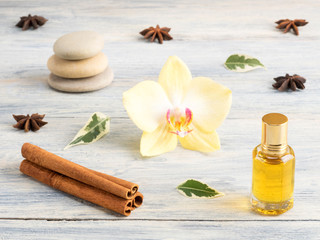 Still life from natural aromatherapy ingredients on a white wooden background