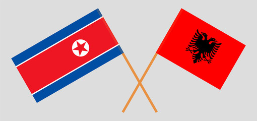 Albania and North Korea. Crossed Albanian and Korean flags