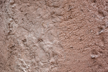 rough stone wall in brown color