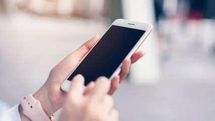 Woman using smartphone, During leisure time. The concept of using the phone is essential in everyday life.