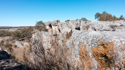 Natural place formed by vegetation and rocks with shapes caused by erosion