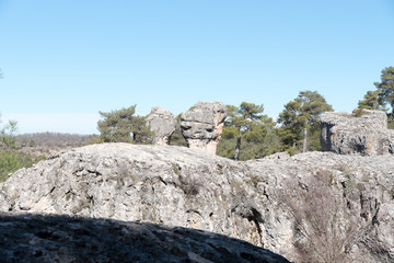 Natural place formed by vegetation and rocks with shapes caused by erosion