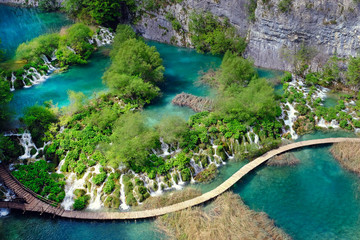 Fototapeta na wymiar Plitvice Lakes National Park, Croatia. Summer view of beautiful waterfalls in Plitvice Lakes