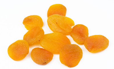 Orange dried apricots isolated on a white background.