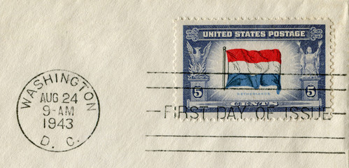 Washington, D.C., The USA - 24 August 1943: Us historical stamp: Netherlands fight for freedom. Flag. The Phoenix Bird. Fetter. Five cents, second world war, fdc cancel