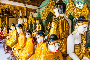 Obraz na płótnie Canvas Buddha statues of the Shwedagon Pagoda at Yangon (Rangoon) in Myanmar (Burma)