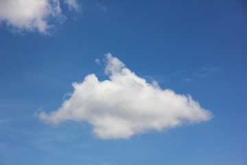 Obraz na płótnie Canvas the beautiful blue sky abstract white cloud shape
