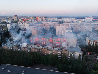 Aerial shots of a fire destroys a residential building in the city quarter