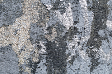 Aged street wall background. Cracked paint wall texture. Old cracked paint concrete wall texture back.
