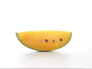 Yellow watermelon on a white background