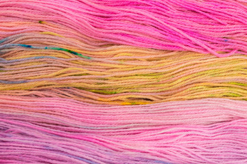 Obraz premium background of multicolored pink wool with yellow, blue and lilac