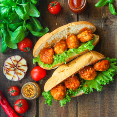 meatballs sandwich (snack with meat and vegetables). food background. top view. copy space