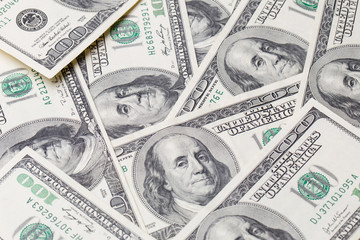 Texture of dollar bills. One hundred dollars.