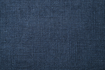 Fototapeta na wymiar Fabric closeup. Dark blue linen texture