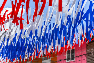 Color of Thai Nation Flag at walking street in Surat Thani province in Thailand. Flags are decorated with various flags