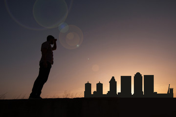 traveler in front of louisville city skyline in united states
